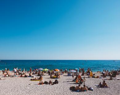 Holiday makers enjoy the beach