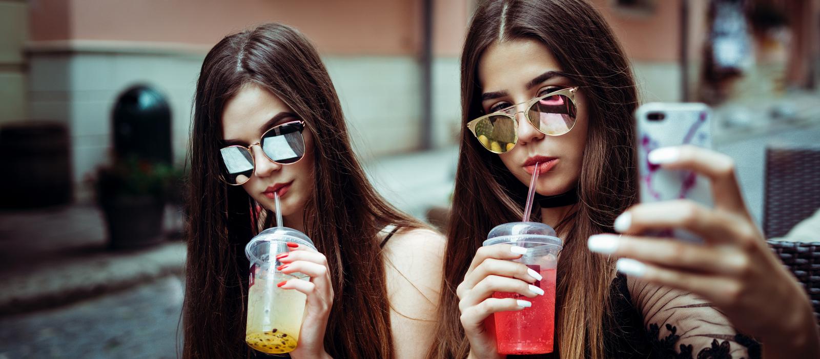 Girls drinking milkshakes