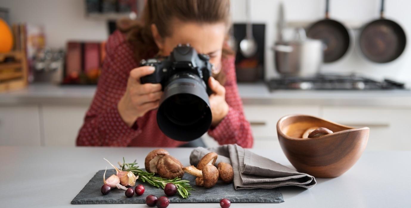 Woman photographs food