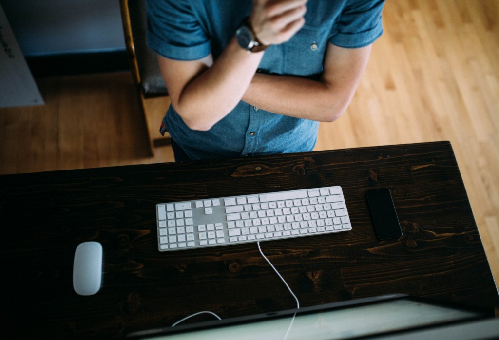 guy looking at computer screen